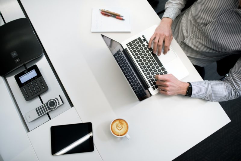 Birdseye view of man at laptop